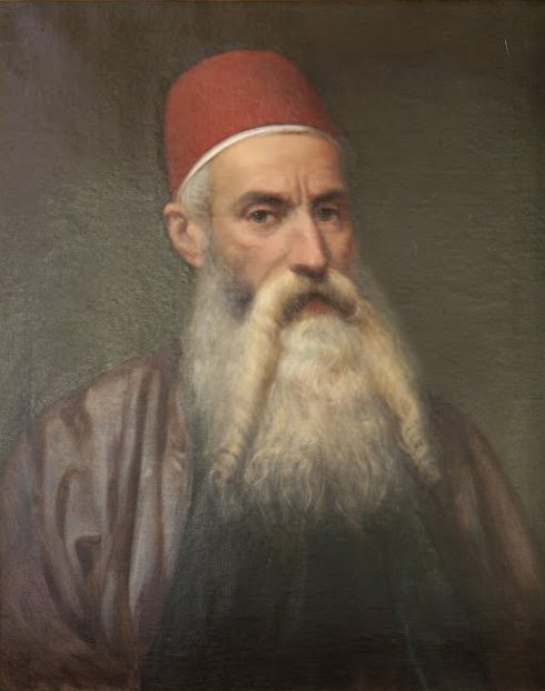 Ritratto ottocentesco dell'esploratore Giovanni Miani con barba bianca e fez rosso